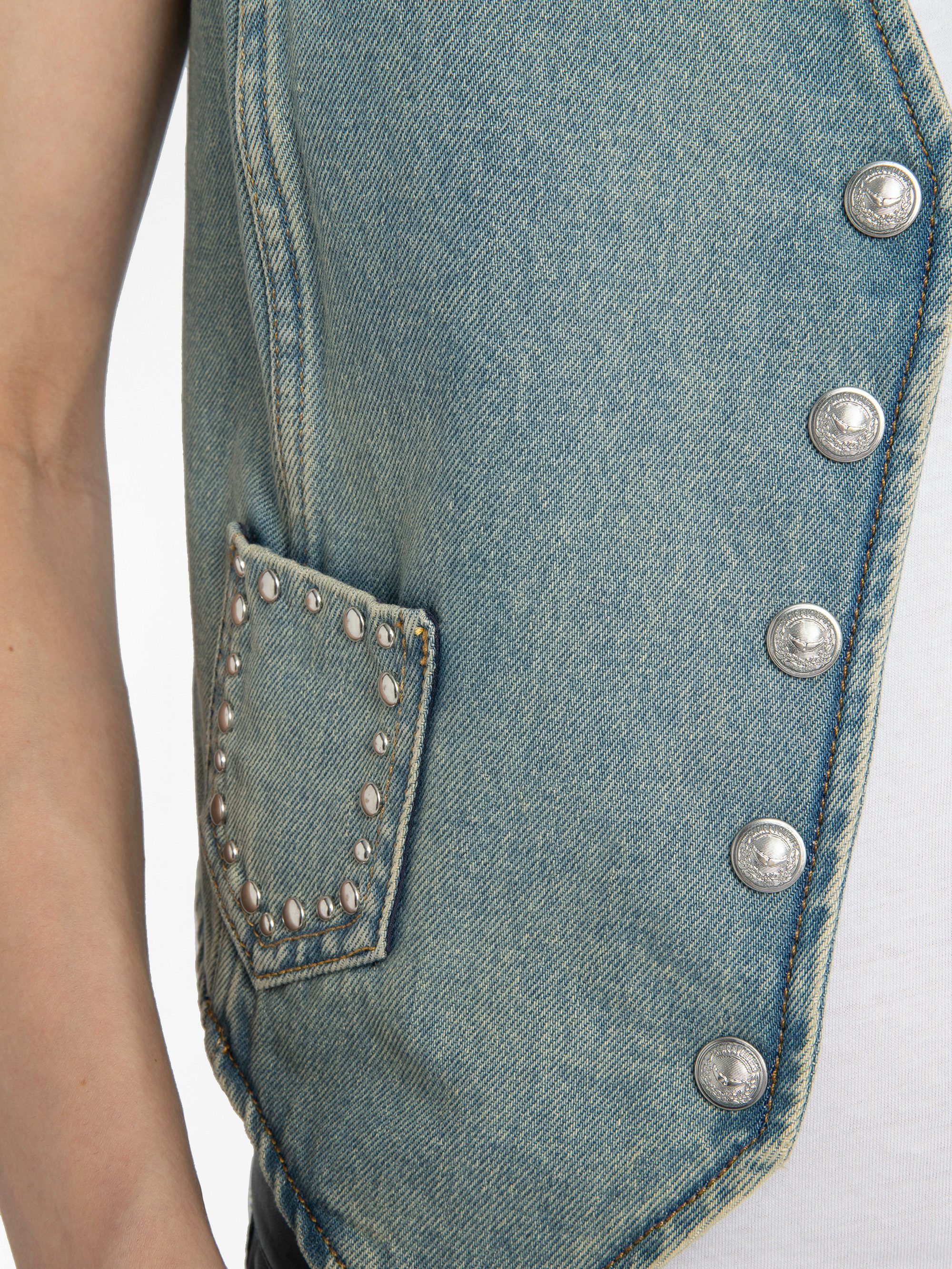 Gillier Denim Vest - This sleeveless denim vest is punctuated with silver studs and a raw edge finish—distressed just right. Layer it over everything, wear it like armor. Bold, free, undeniably Zadig.